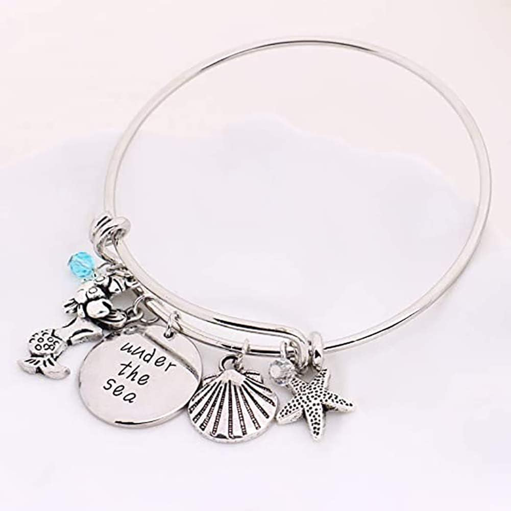 Oceanic Charms: Starfish, Shell, Crab Bangle