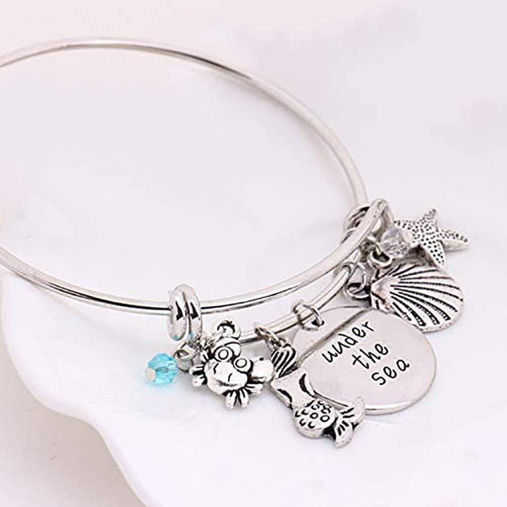 Oceanic Charms: Starfish, Shell, Crab Bangle